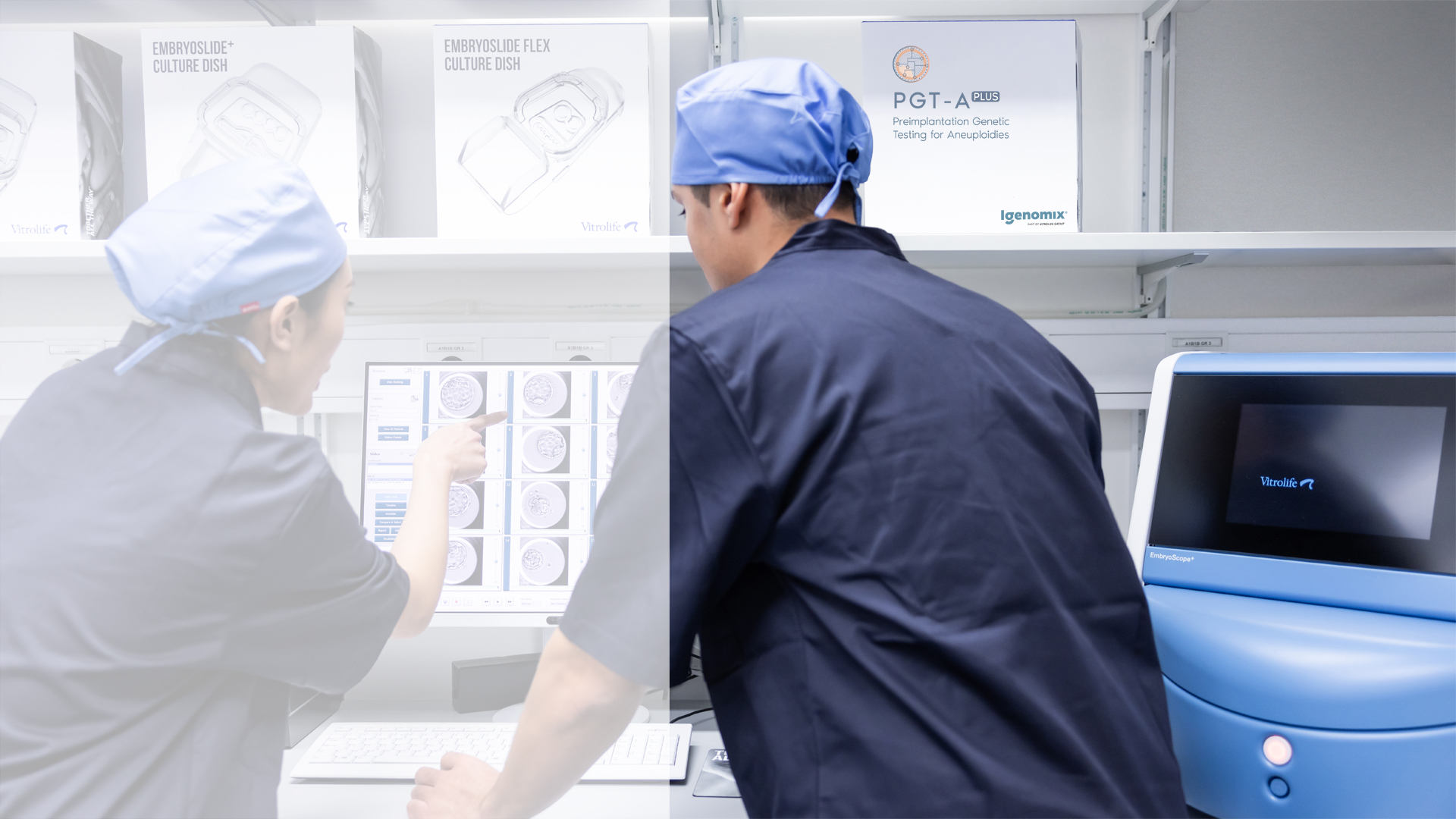 Two embryologists in front of an EmbryoScope time-lapse